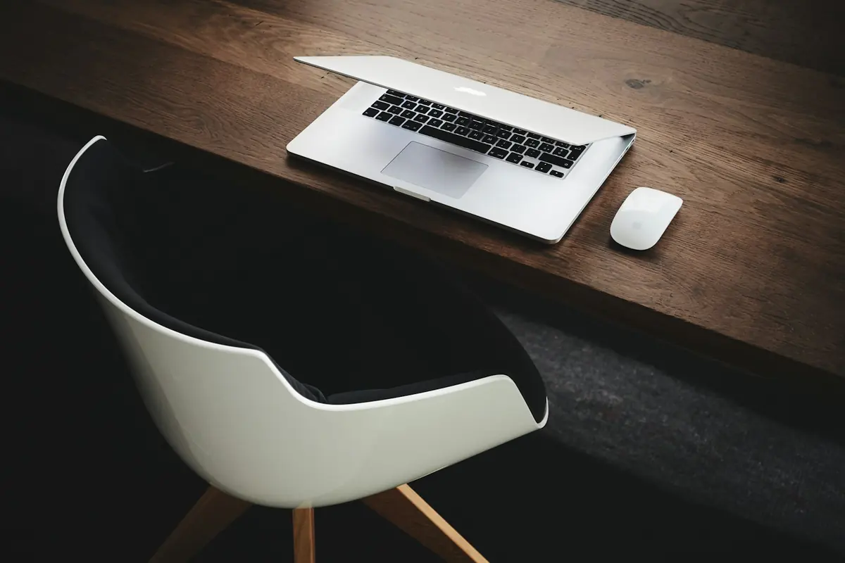 Writing website content at a laptop